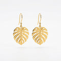 Boucles d'Oreilles Pendantes Feuilles Tropicales Dorées - Maison Bijoux